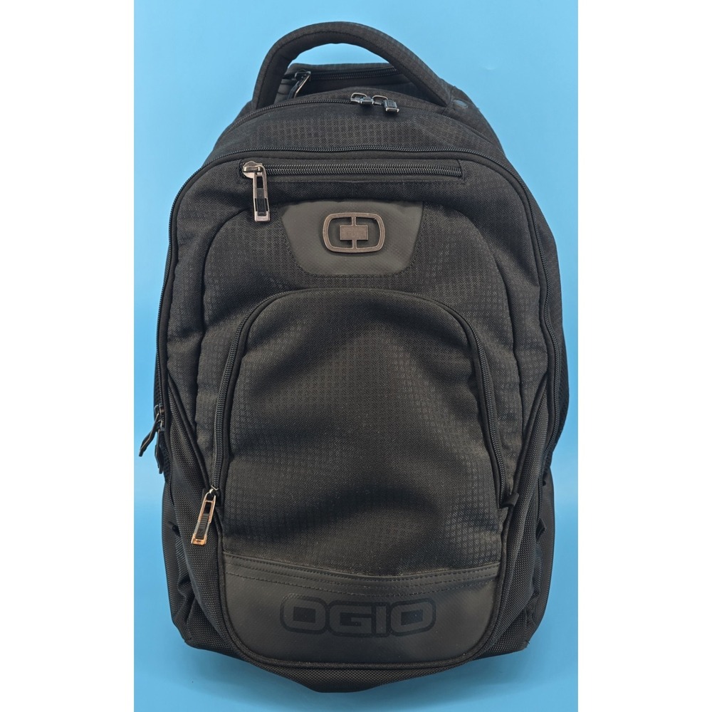 Ogio Black Wheelie Rolling Carry On Backpack Multi Pocket Laptop Straps Zip NWOT